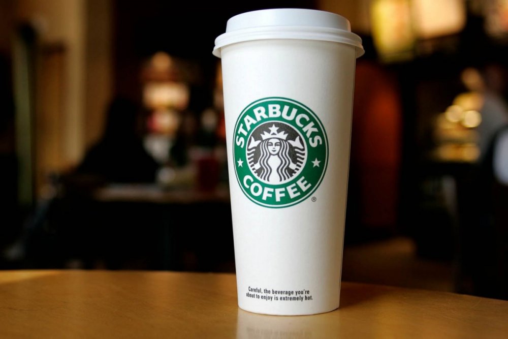A-cup-displaying-the-Starbucks-Coffee-logo[1].jpg
